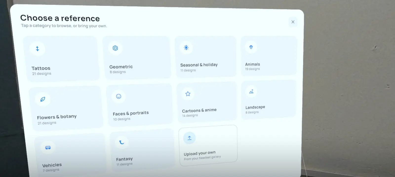 The reference library inside the headset, with categories such as tattoos, animals, landscape and fantasy